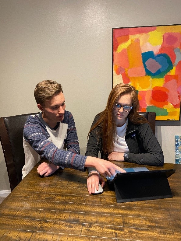 Third-year medical students James Pathoulas and Ally Fuher at the University of Minnesota work on PPE collection efforts and the COVID-19 Crises Innovation Lab course. 