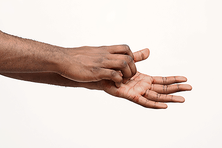 Man inspecting his palm