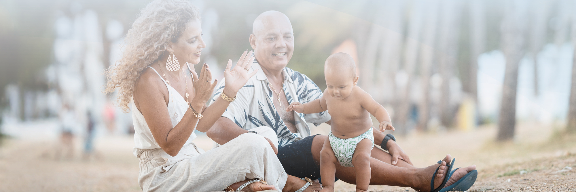 Card image of couple with baby for awareness months and days