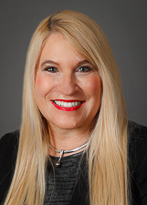 Headshot of Alina Bridges, DO, FAAD