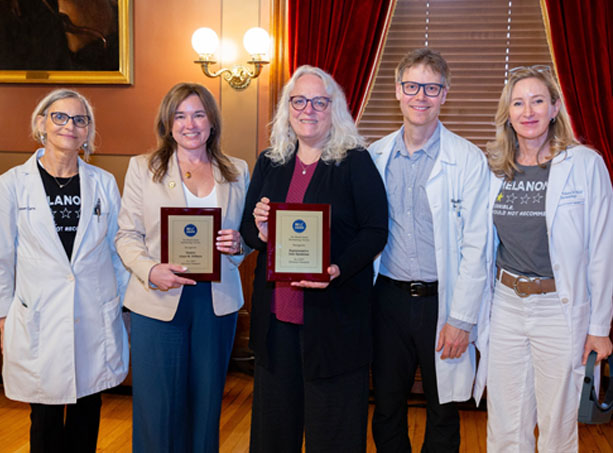 From left, R.I. Dermatology Society Vice President Dr. Kathleen Carney-Godley, Sen. Alana M. DiMario, Rep. June S. Speakman, R.I. Dermatology Society President Dr. Reuben Reich, and Secretary Dr. Valerie Tokarz.