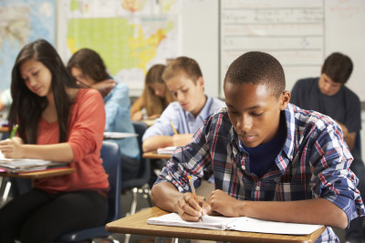 students at desks in classrooms