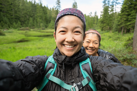 Two women taking a selfie while hiking