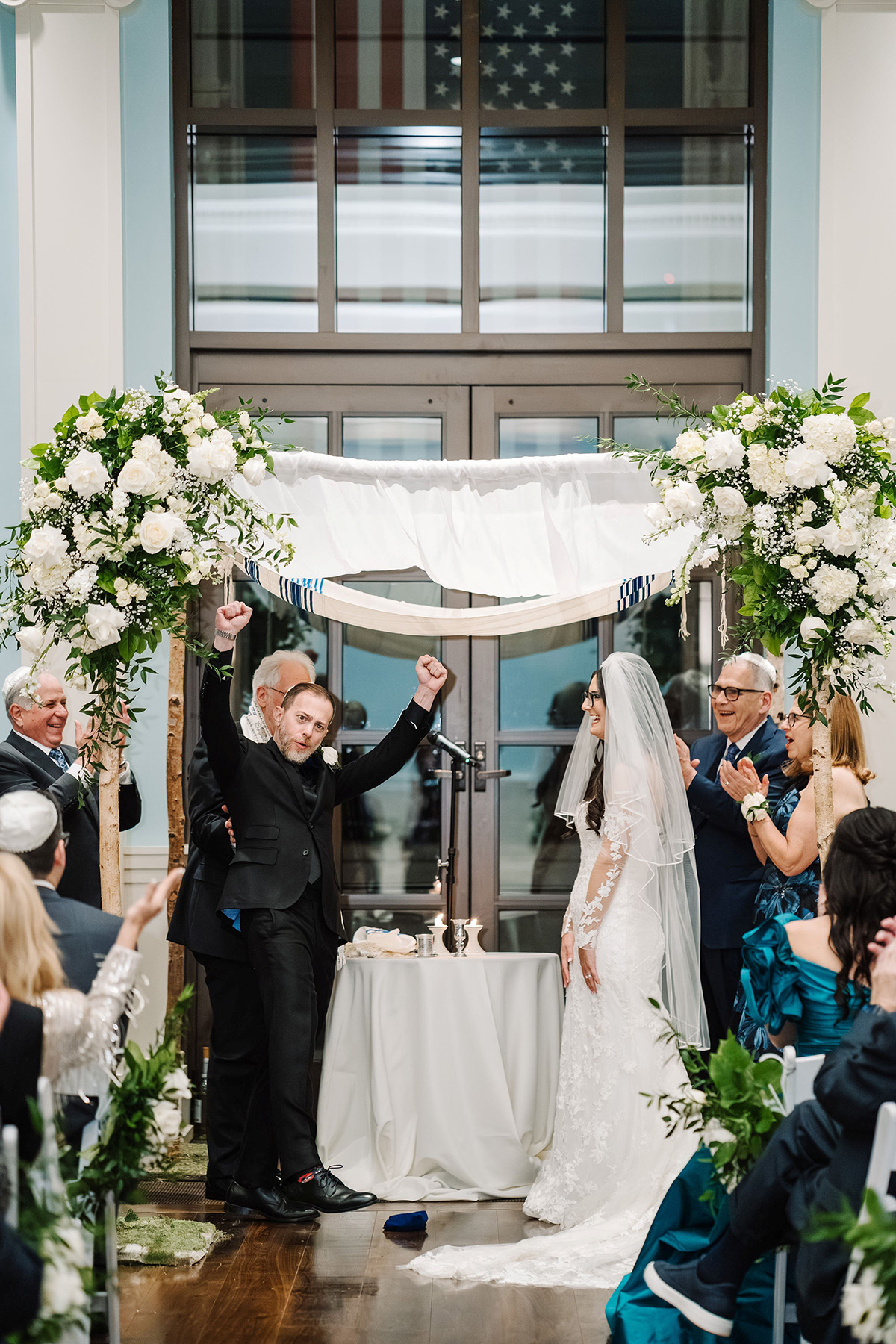 Son in law and daughter of Dr. Heymann at their wedding ceremony after triumphantly stepping on the glass | American Academy of Dermatology (AAD).