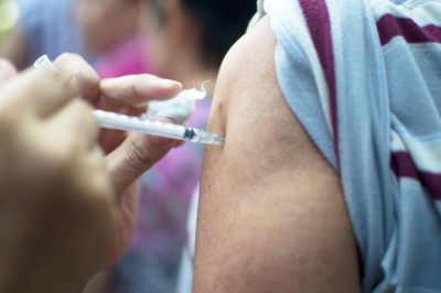person getting vaccinated