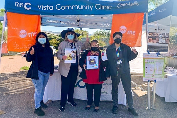 Under the Vista Community Clinic tent in Vista, California.