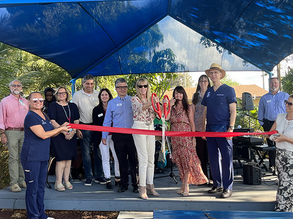 A ribbon-cutting ceremony for AAD shade structure. 