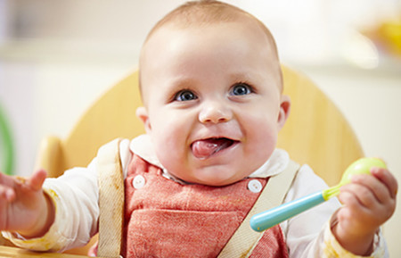 Happy baby. Find out if something on your child’s own body could be triggering the eczema.