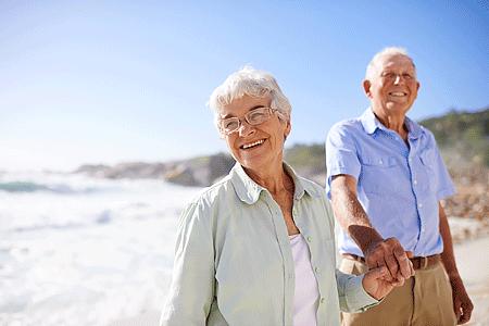 Shot of a happy elderly couple on the beach
