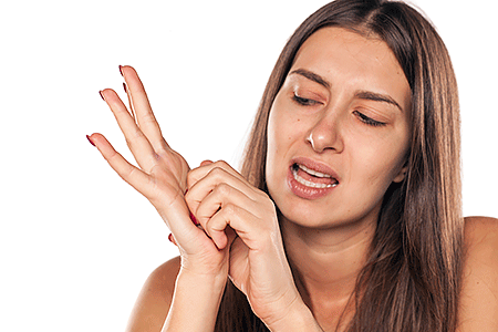 Woman scratching itchy palm of hand