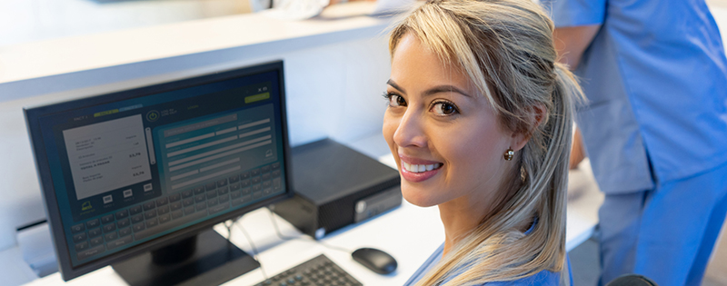 Nurse typing on a computer