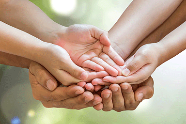 Group of hands together for donation