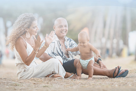 Card image of couple with baby