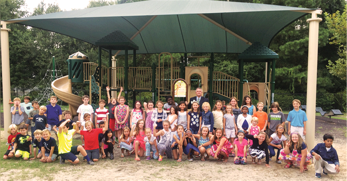 Shade structure for a playground made possible by AAD's Shade Structure Grant Program.