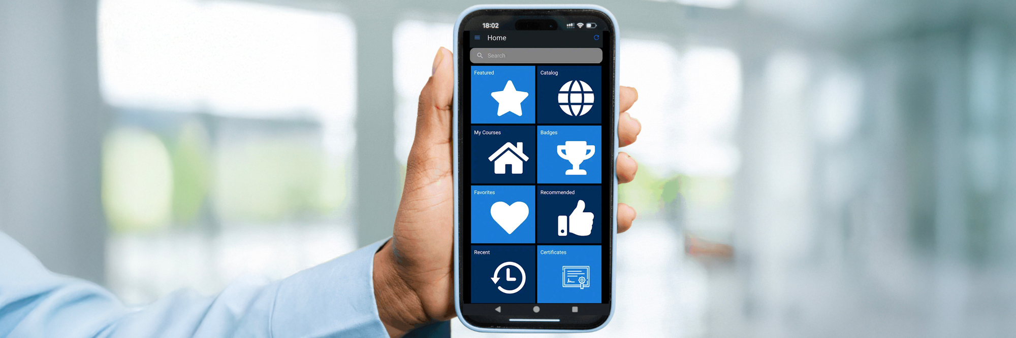 Image for Impact Report of a phone showing the AAD Learning Center app
