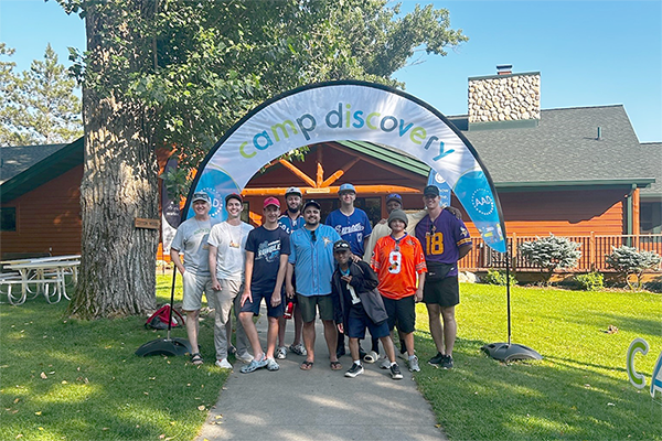 Medical student Creighton Pfau (far right) with his new Camp Discovery friends.