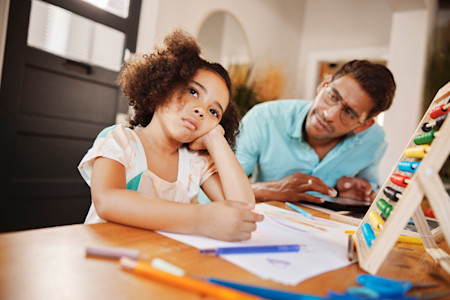 A child with atopic dermatitis is easily distracted and has lost interest in her schoolwork, which can be signs of ADHD. 