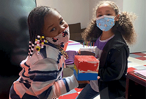 Good Skin Knowledge: Girls from the after-school program have fun with GSK activities.
