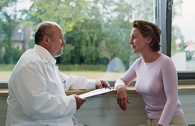 woman consulting with physician