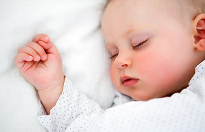 sleeping baby. When eczema is under control, a child can sleep peacefully.