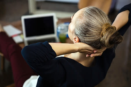 Woman with hair tightly pulled back