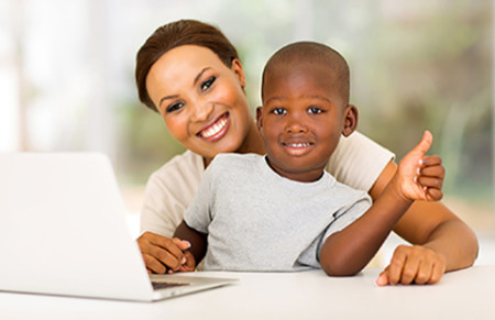 boy and mom and laptop