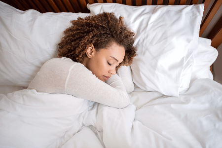 Young woman with primary hyperhidrosis sleeps peacefully