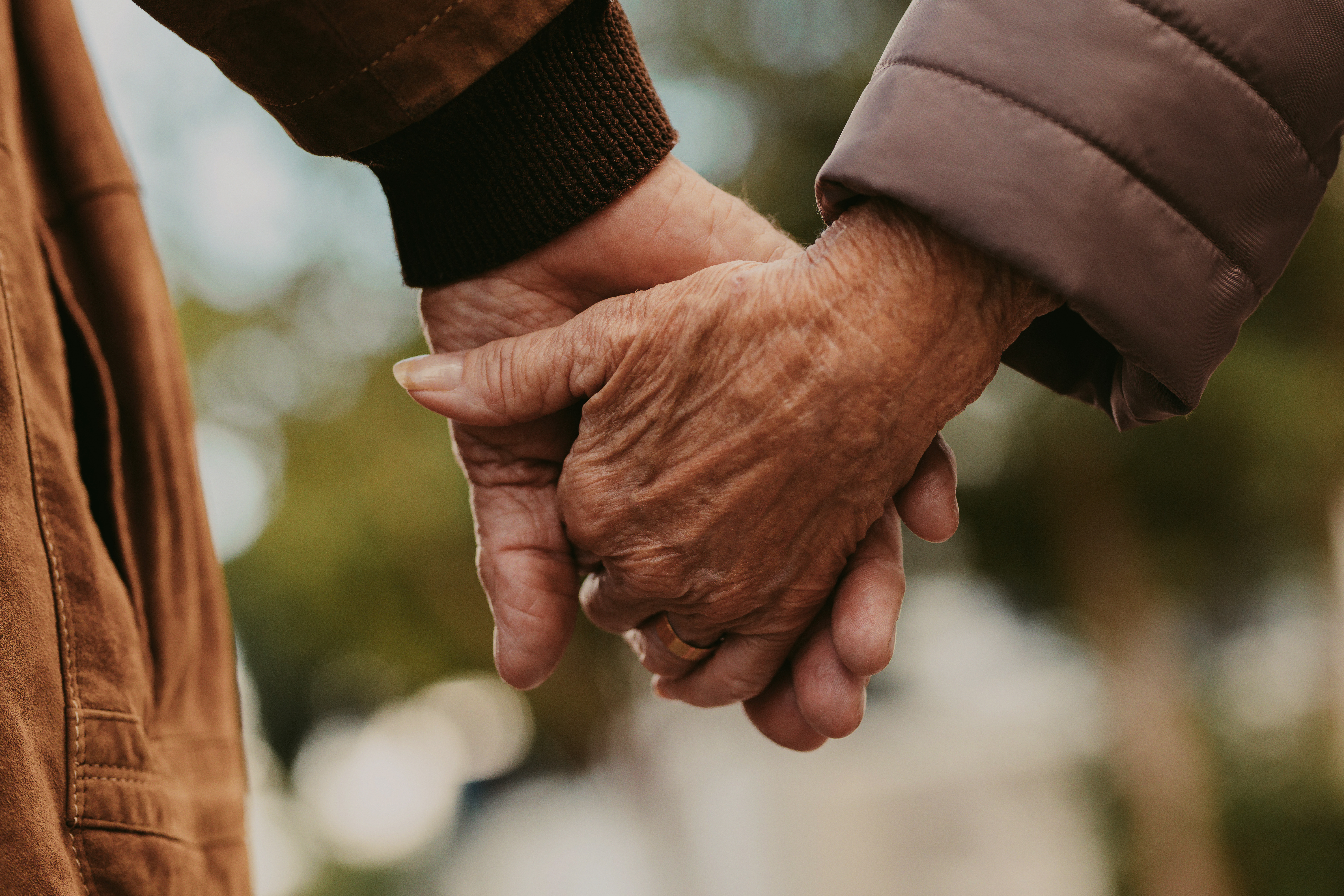 2 people holding hands