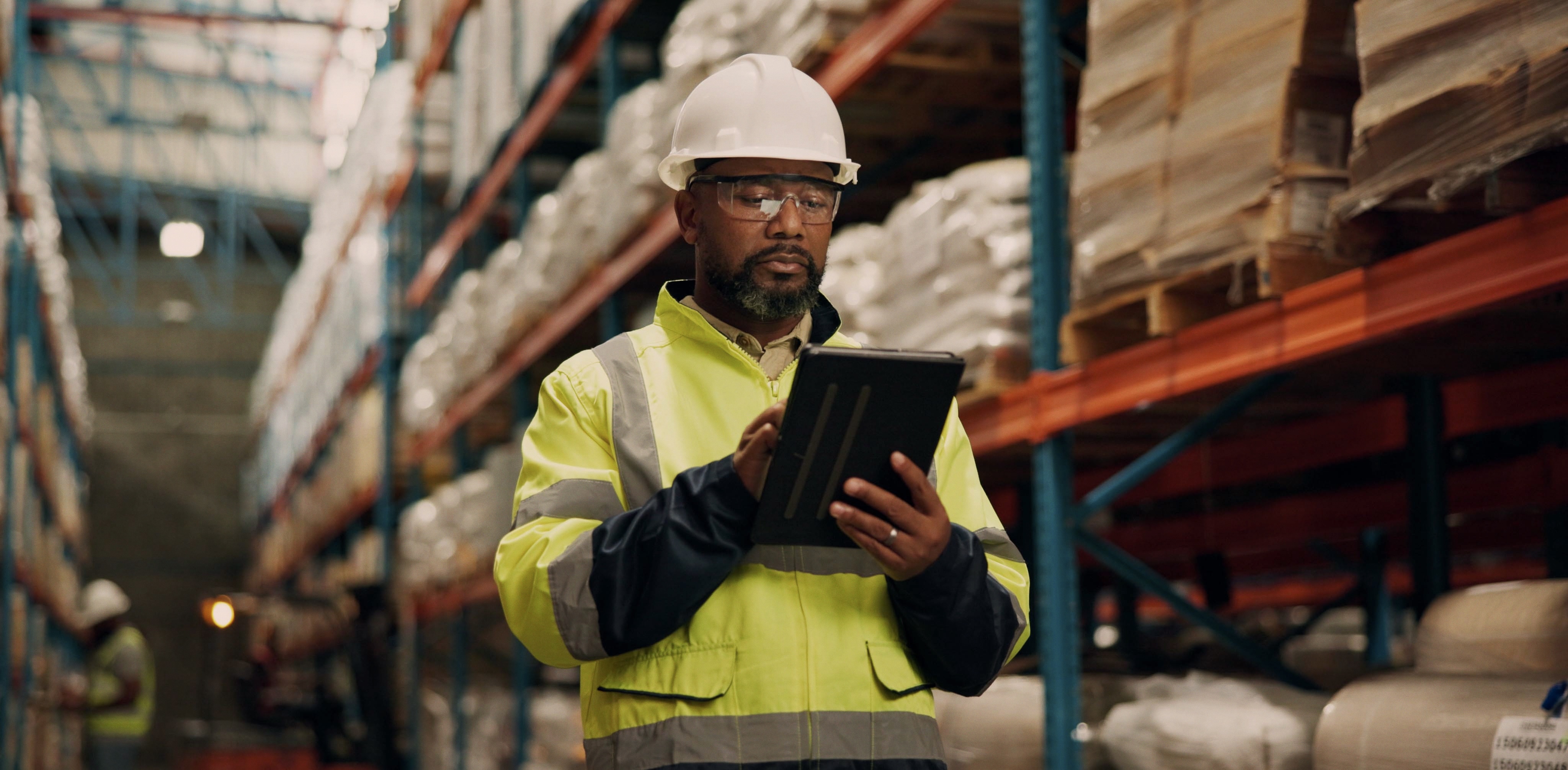 Warehouse worker checking inventory