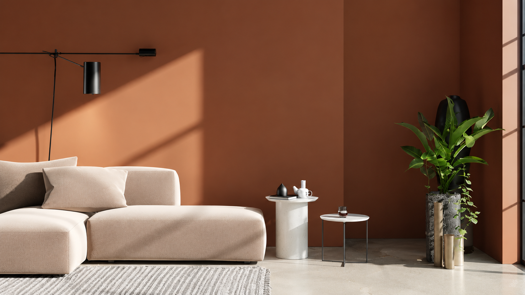 Living room with a burnt orange modular sofa against a pale wall