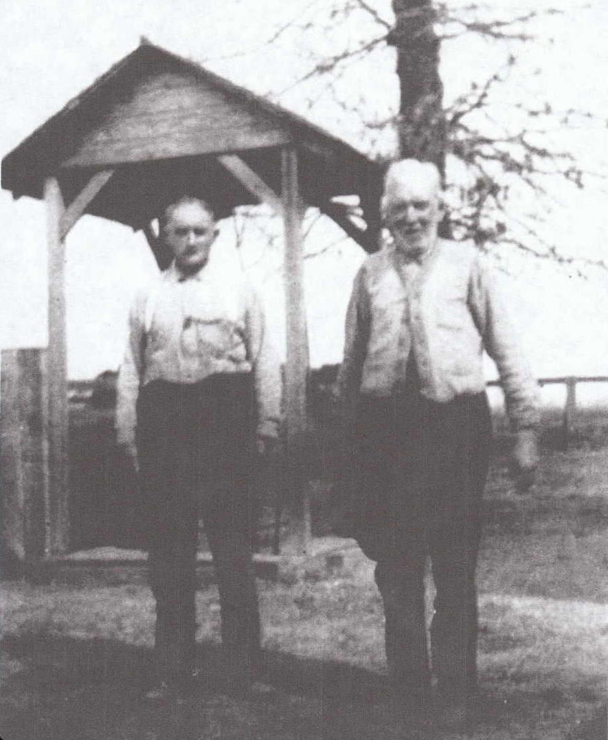 Sanford standing with his son - Benjamin Ramsey (left), Sanford Ramsey (right)