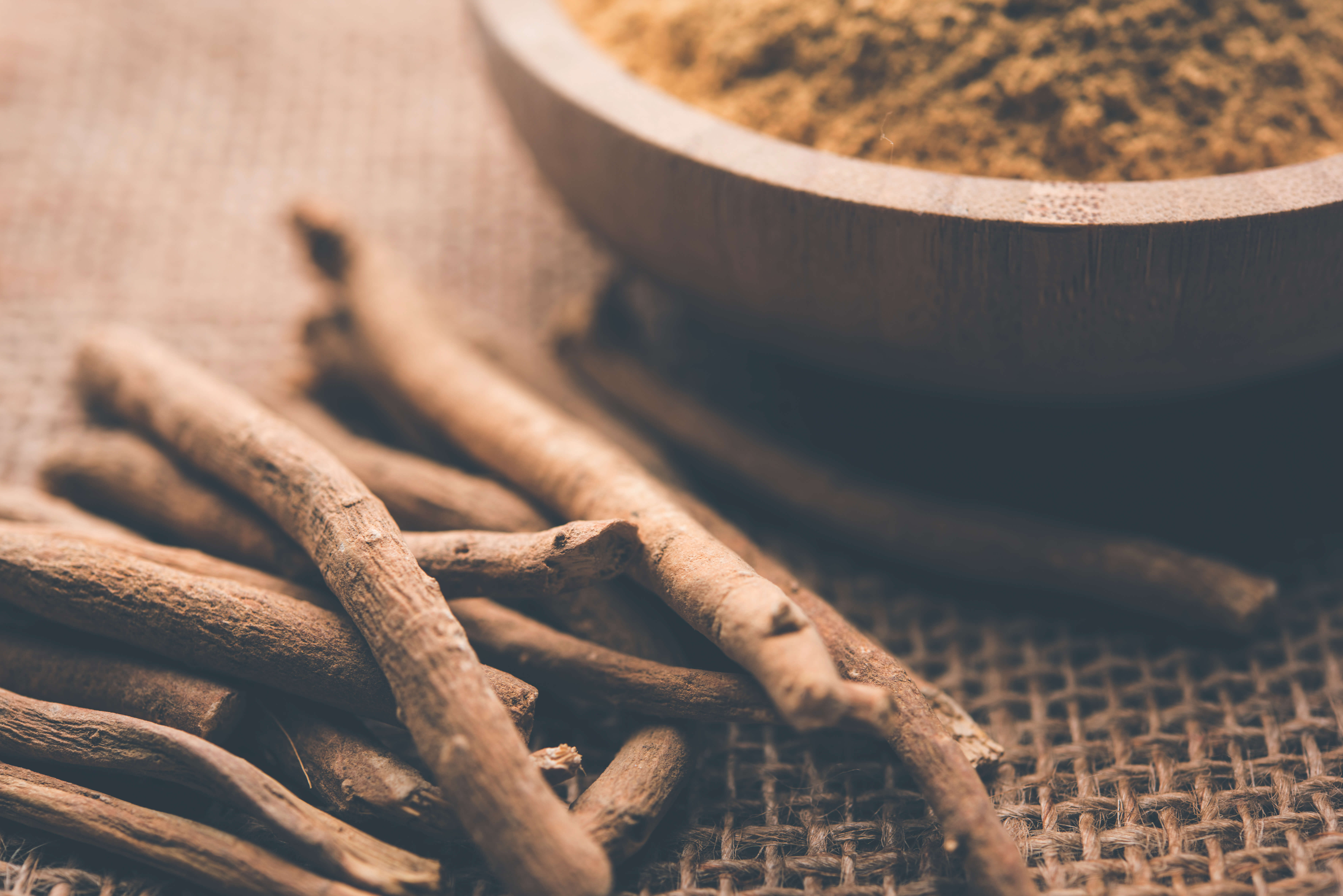 Ashwagandha for Dogs: A Nature-Based Solution for Stress 3 Ashwagandha for Dogs root and powder on top of a textured placemat.