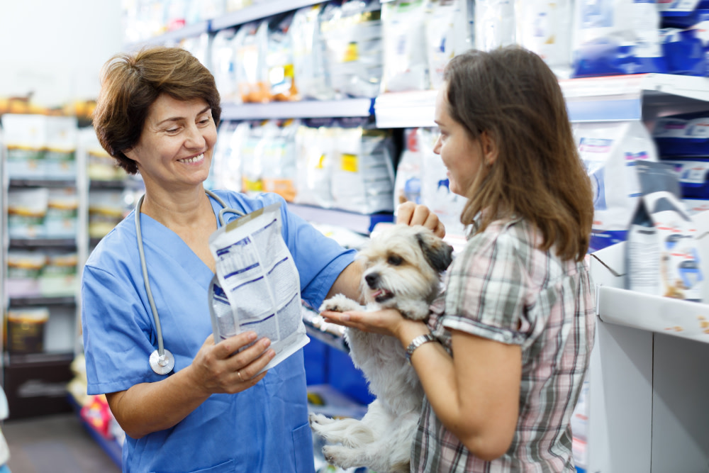 Natural Immune Booster for Dogs: A Guide 4 woman buying dog food