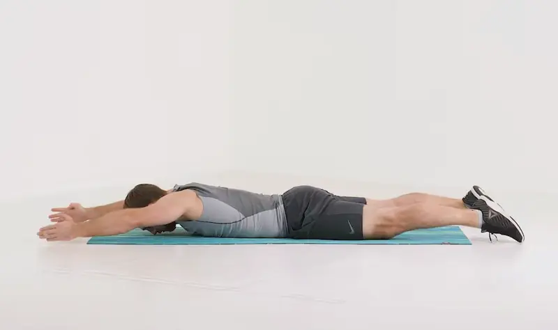 https://welltechdev.wpengine.com/wp-content/uploads/2023/10/superman_back-exercises-without-weights.webp
