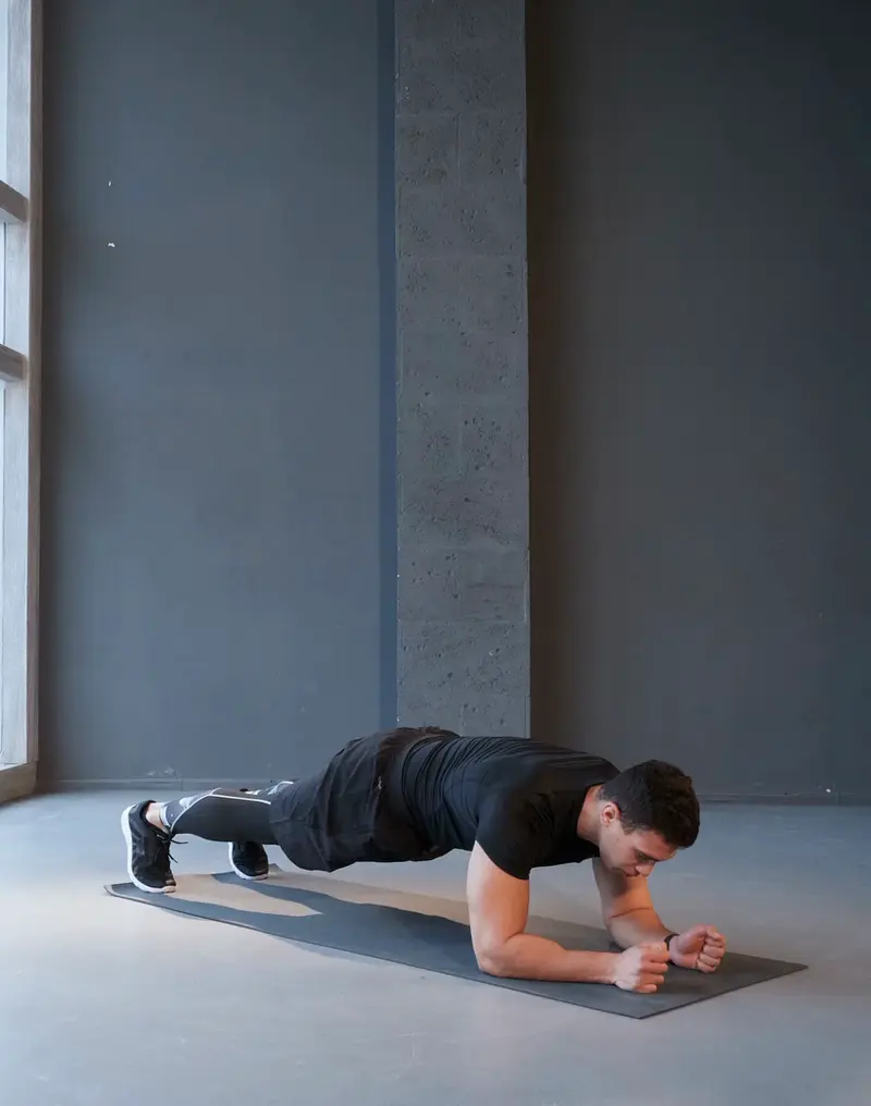 https://welltechdev.wpengine.com/wp-content/uploads/2023/10/Front-Plank_Calisthenics-for-Beginners.webp