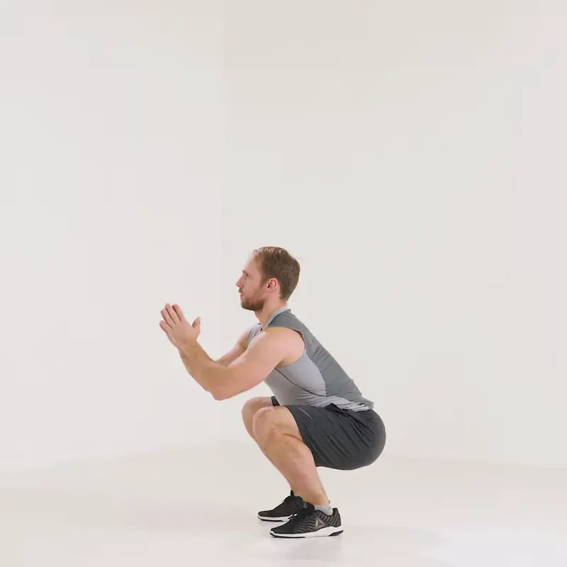 https://welltechdev.wpengine.com/wp-content/uploads/2023/07/squat-to-calf-raise_leg-day-warm-up.webp