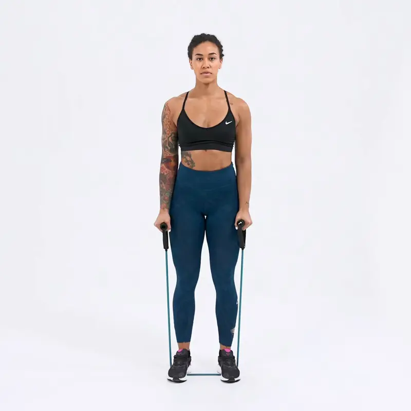 https://welltechdev.wpengine.com/wp-content/uploads/2023/10/hammer-curl-with-resistance-band_strength-training-for-women-over-50.webp