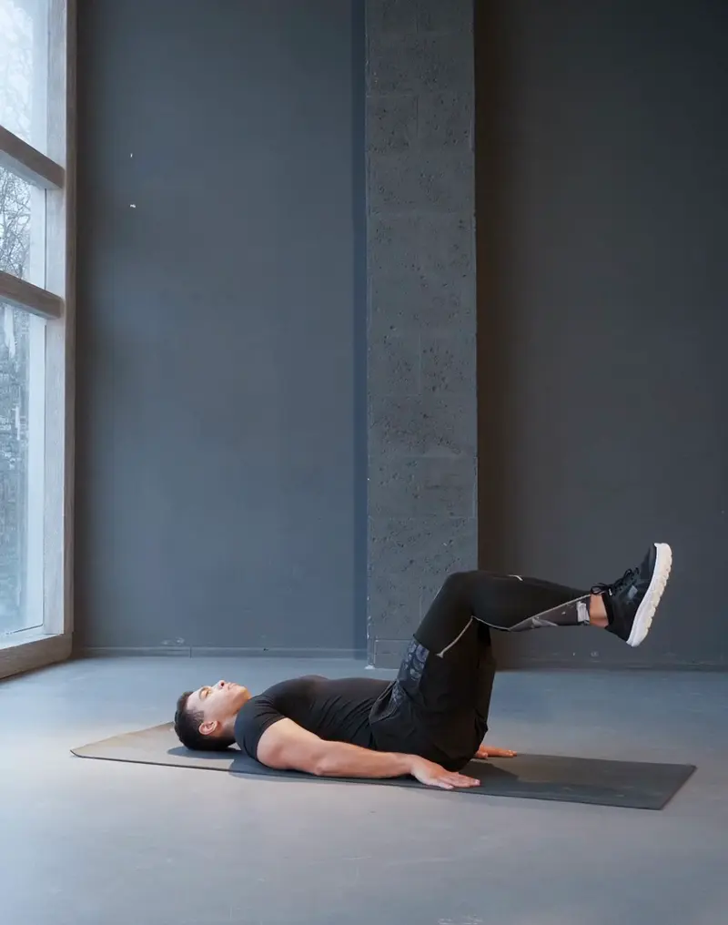 https://welltechdev.wpengine.com/wp-content/uploads/2023/10/Reverse-Crunch_Calisthenics-for-Beginners.webp