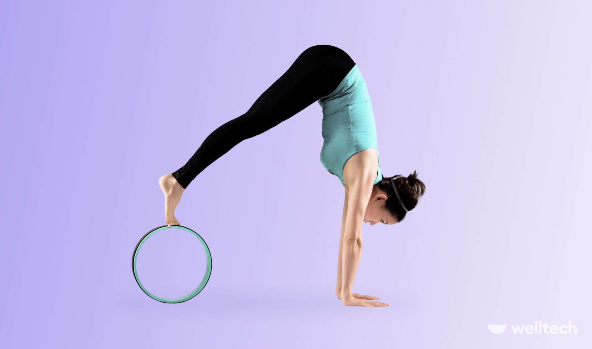 https://welltechdev.wpengine.com/wp-content/uploads/2023/01/Pike-Handstand-Prep_yoga-wheel-stretches.jpg