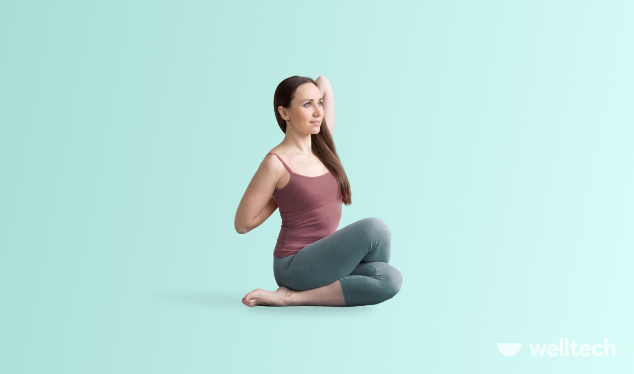 https://welltechdev.wpengine.com/wp-content/uploads/2023/02/Cow-Face-Pose_it-band-stretches-yoga.jpg