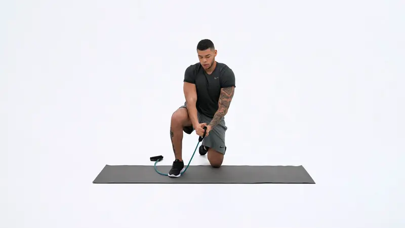 https://welltechdev.wpengine.com/wp-content/uploads/2023/05/Handle_Band_Half_Kneel_Wood_Chop_ab-exercises-that-dont-hurt-lower-back.webp