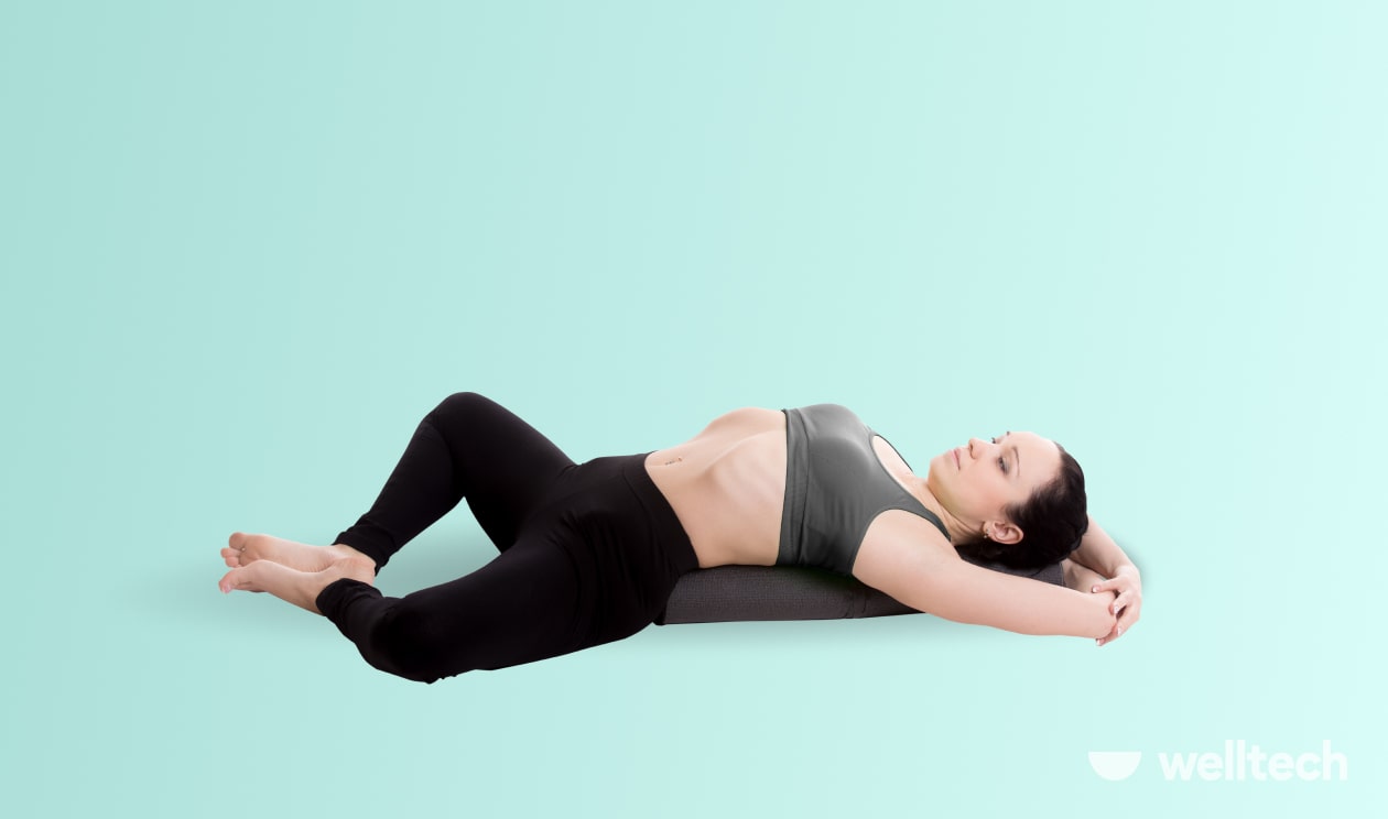 https://welltechdev.wpengine.com/wp-content/uploads/2023/08/8.-Reclined-Bound-Angle-Pose-Supta-Baddha-Konasana_yoga-poses-relaxing.jpg