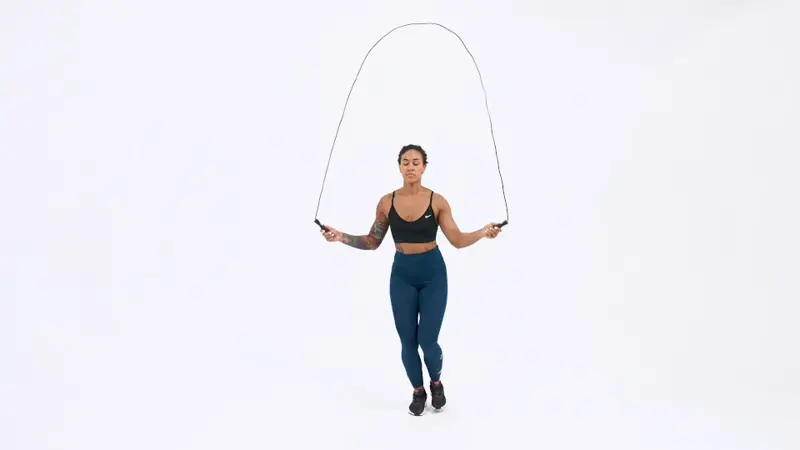 https://welltechdev.wpengine.com/wp-content/uploads/2023/07/jump-rope-one-leg-hop_knee-fat-exercises.webp