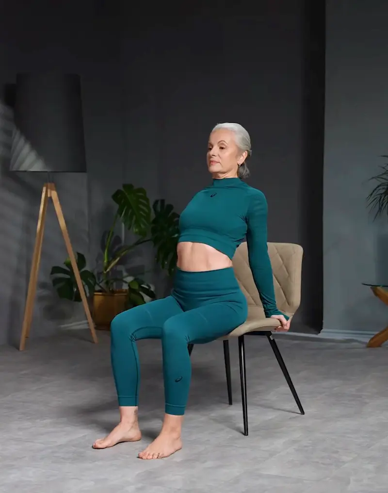 https://welltechdev.wpengine.com/wp-content/uploads/2023/08/camel_pose_chair-yoga-for-seniors.webp
