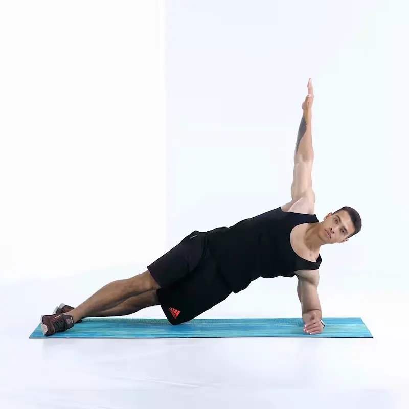 https://welltechdev.wpengine.com/wp-content/uploads/2023/05/plank-reach-through_full_ab-exercises-that-dont-hyrt-lower-back.webp