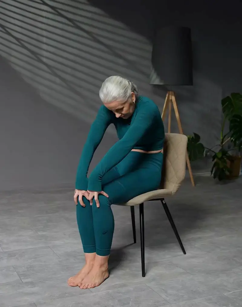 https://welltechdev.wpengine.com/wp-content/uploads/2023/08/cat-and-cow-poses_chair-yoga-for-seniors.webp