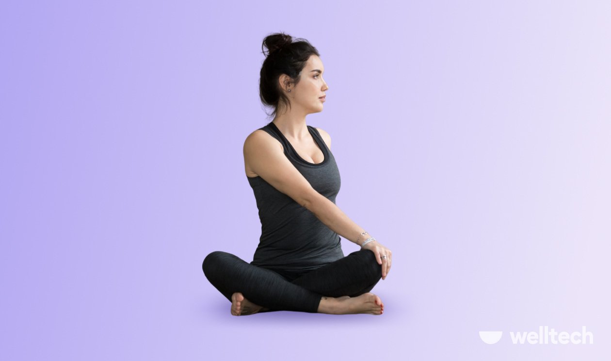 https://welltechdev.wpengine.com/wp-content/uploads/2023/05/Revolved-Easy-Pose_seated-yoga-poses.jpg