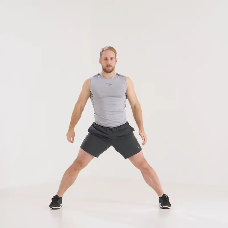 https://welltechdev.wpengine.com/wp-content/uploads/2023/07/side-split-squat_leg-day-warm-up.webp