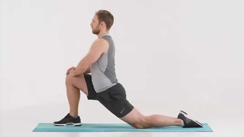 https://welltechdev.wpengine.com/wp-content/uploads/2025/02/Lunging-Hip-Flexor-Stretch.webp