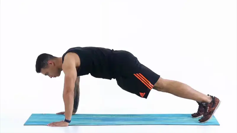 https://welltechdev.wpengine.com/wp-content/uploads/2023/06/spiderman-push-up_burpee-alternatives.webp